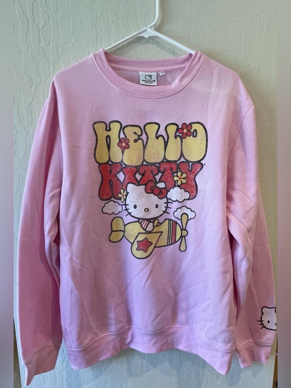 Hello Kitty Pink Pullover Sweatshirt with Yellow & Red Airplane Graphic
